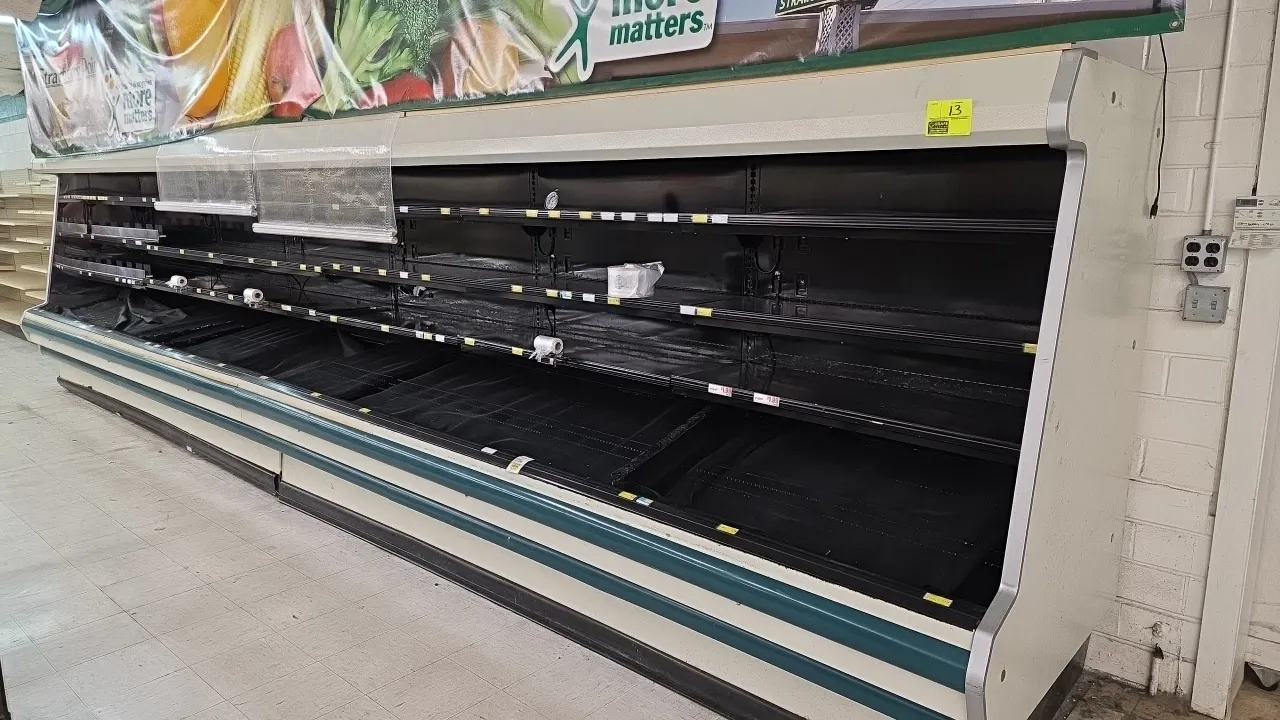 2005 Hussmann M4-12E U medium-temp multi-deck open display cases. Features multi-tier adjustable shelving, price tag moldings, canopy lighting, and pu