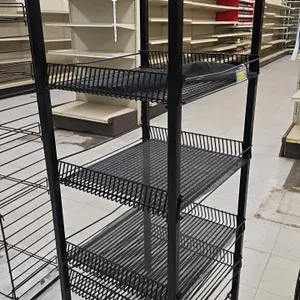 Metal 5-tier merchandiser display rack. Features wire basket shelving with mesh liners and a black powder-coat finish. Dimensions: 19" x 21.5" x 54".