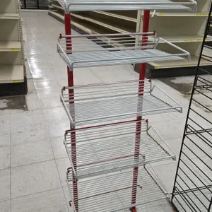 Metal 5-tier merchandiser display rack. Features a red tubular metal frame with (5) white wire display shelves. Freestanding floor base design.