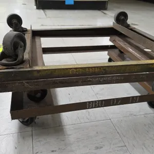 Steel 4-wheel material handling dollies. Features open-frame steel construction. Mounted on swivel casters. 23" x 27".