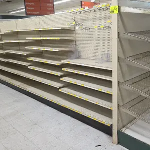 72'L of Lozier gondola shelving. Includes (1) 4' end cap. Features 72"H uprights, 22"D base shelves, pegboard backing, adjustable upper shelves, and s