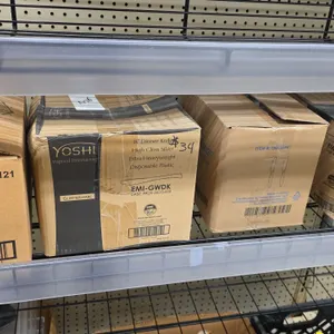 Assorted disposable plastic dinnerware lot. Includes (3) boxes of plastic dinner knives including Yoshi Glimmerware EMI-GWDK 8" high-gloss silver extr