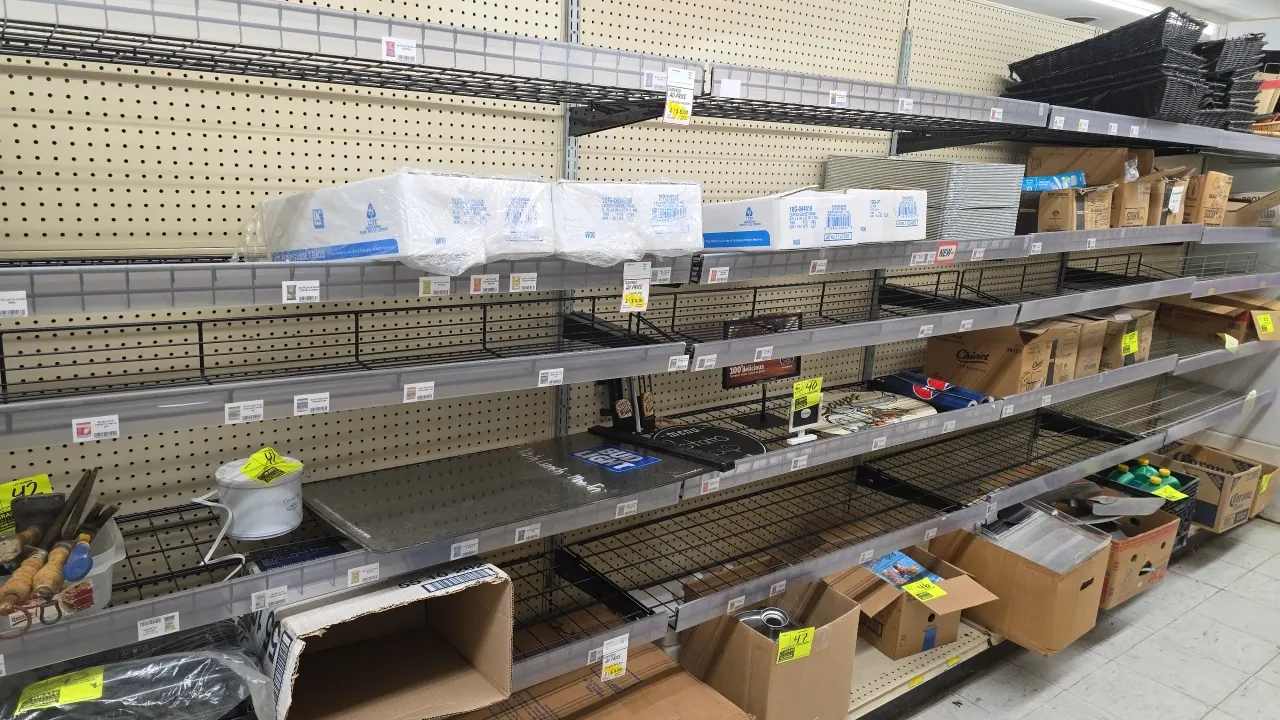 Wire shelves with galvanized wall brackets. Features 48"L wire display shelves with shelf-edge label holders and galvanized slotted wall upright stand