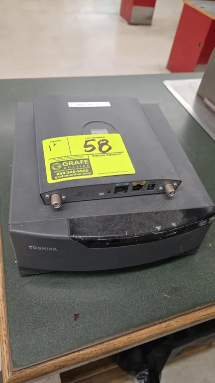 Package lot including a 2015 Toshiba 4810-E50 POS system controller base (S/N: 41BTW69) and a Cisco AIR-AP1242AG-A-K9 Aironet wireless access point (S