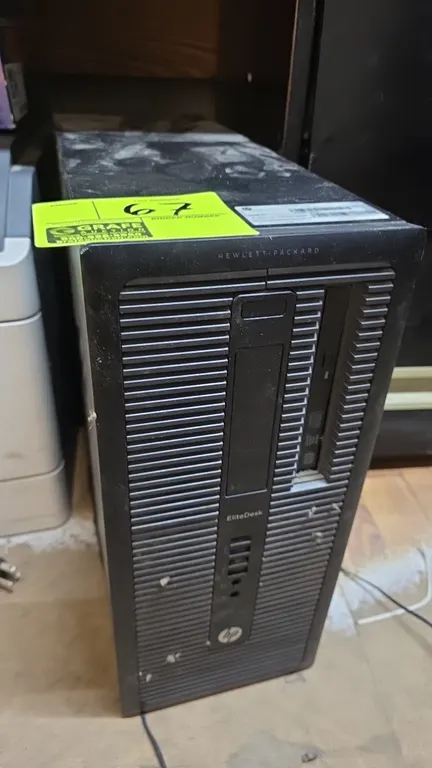 HP EliteDesk 800 G1 TWR computer tower. Features front optical drive, front USB ports, and audio jacks. Product No. J6D89UT#ABA. S/N: 2UA5010N23.