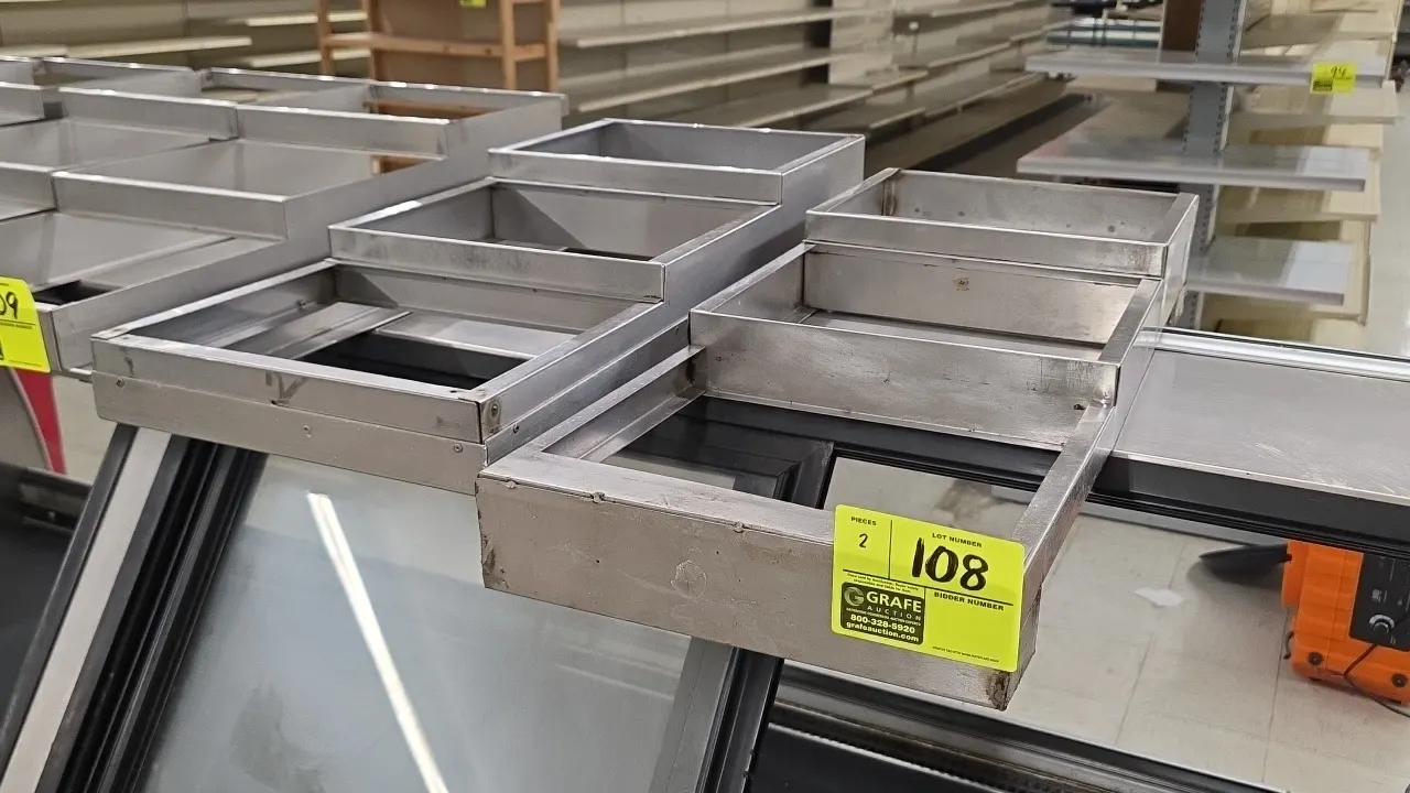 Stainless steel 3-tier pan insert platforms. Features stepped 3-tier design for food pans. Dimensions: 13" x 23" and 13.5" x 31".
