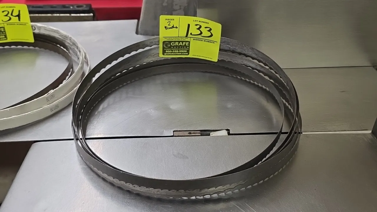 Stainless steel meat saw blades. Features a scalloped cutting edge designed for meat and bone band saws.