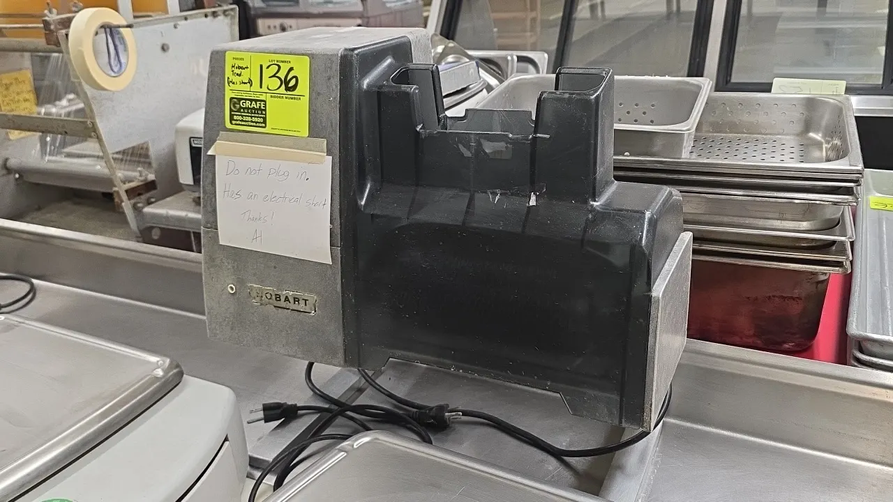 Hobart 403 Steakmaster meat tenderizer. Features tenderizer blade assembly and plastic guard. S/N: 1853502. Electrical: 115V, 60 Hz, 1-Phase, 8.1 A, 1