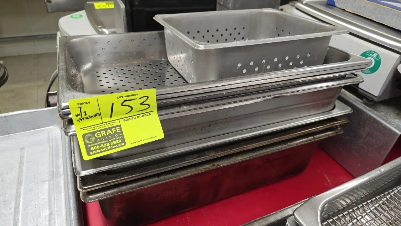 Assorted stainless steel steam table pans. Includes (2) full-size 6"D pans, (4) full-size 4"D pans, (2) full-size 2"D pans, (2) full-size 2"D perforat