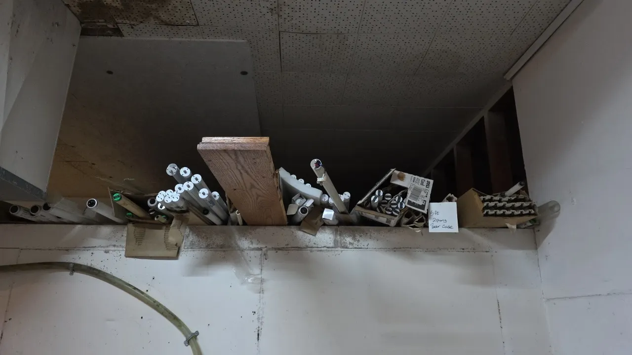 Assorted fluorescent tube lights. Includes a variety of lengths, pin configurations, and styles across multiple boxes and loose tubes, with brands inc