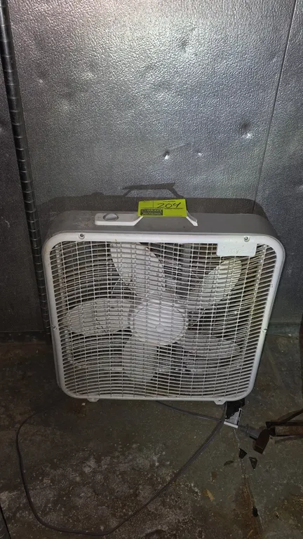 Aerospeed portable box fan. Features molded plastic housing, 5-blade design, top-mounted 3-speed rotary dial control, and integrated carry handle.