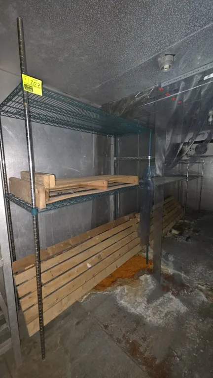 Metro 2-tier metal wire shelving units. Features wire shelves. Includes a quantity of wood decking boards. (2) 5'L x 2'W and (1) 6'L x 2'W; 5'H and 7'