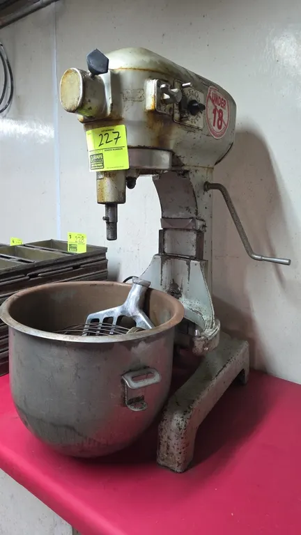 Hobart AS 200T 20-quart commercial mixer. Features 3-speed transmission, 15-minute timer, front attachment hub, and manual bowl lift. Includes stainle