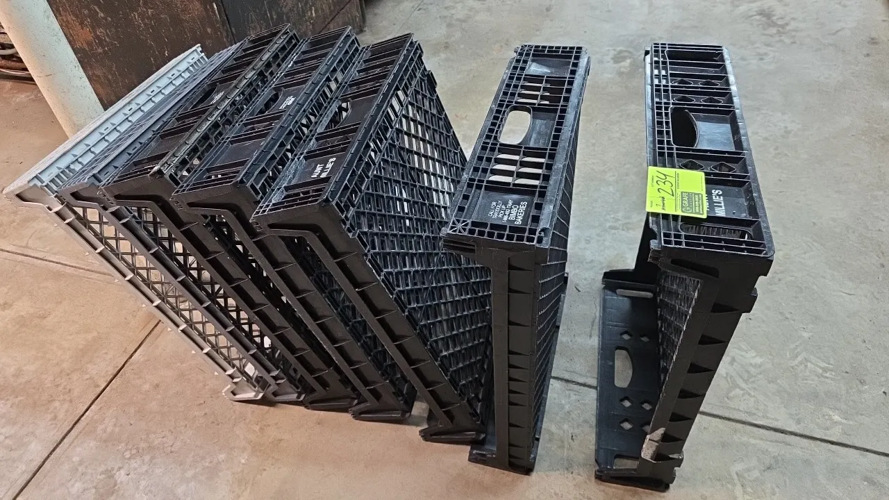 Poly bread trays. Features molded plastic construction with ventilated diamond lattice bottoms, open sides, integrated carry handles, and stackable ne