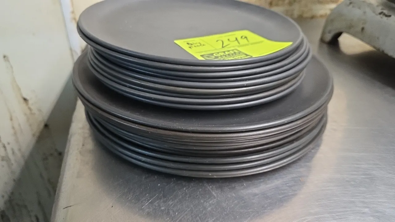 American Metalcraft metal plates. Features round metal construction with a dark matte finish. Includes 10" and 12" plates.
