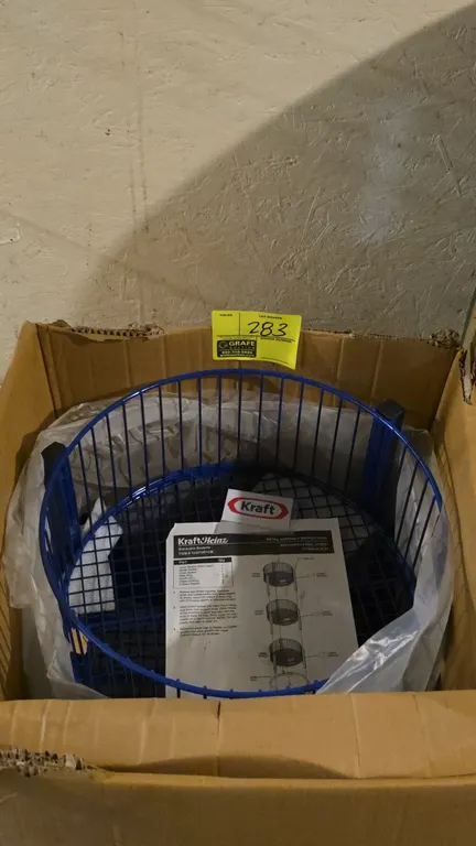 2021 Kraft Heinz 12537601CM 3-tier wire basket merchandiser display. Features blue round stackable wire baskets, mobile caster base ring, and Kraft lo