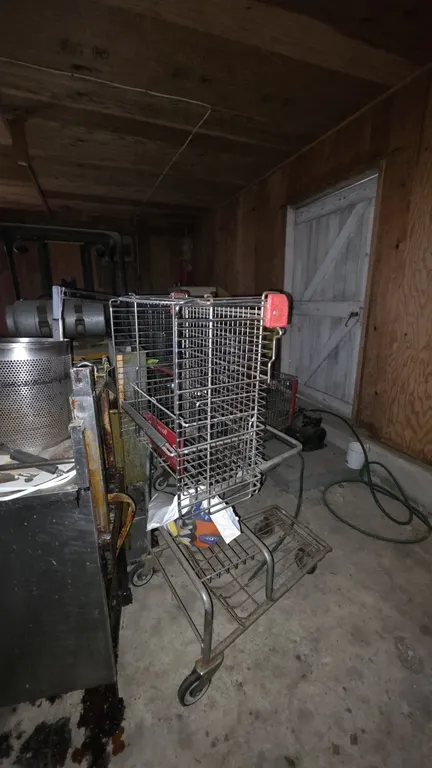 Assortment of wire shopping carts. Includes over-the-counter (OTC) wire convenience carts and (1) full-size wire grocery cart. Features wire basket co