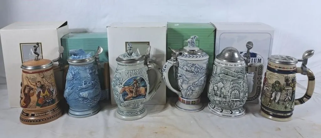 Assortment of Avon and Millennium Ceramic Steins