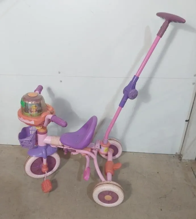 Pink and purple children's push tricycle