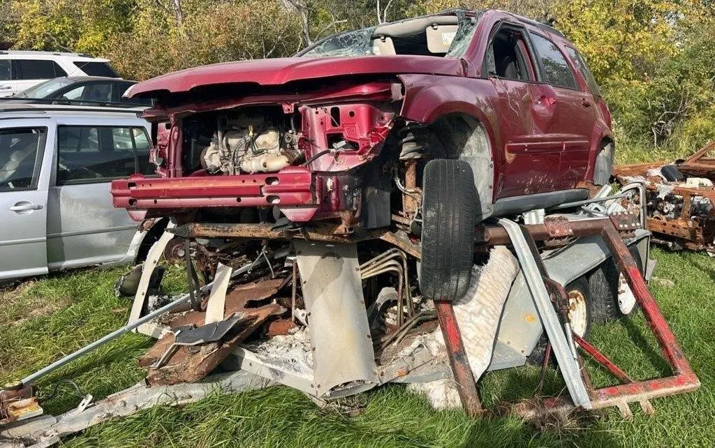 Salvage Vehicles - GMC Torrent on a Flat Deck