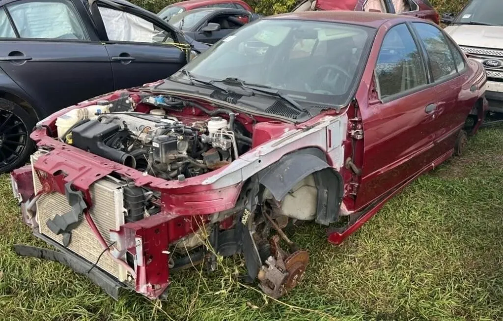 Salvage Vehicle - Pontiac Sunfire 4DR Car. No