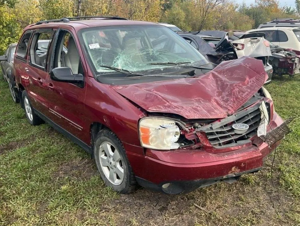 Salvage Vehicle - Ford Minivan. PARTS ONLY. #LOC: