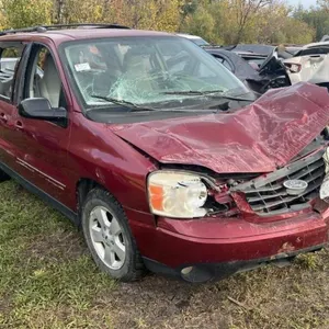 Salvage Vehicle - Ford Minivan. PARTS ONLY. #LOC: