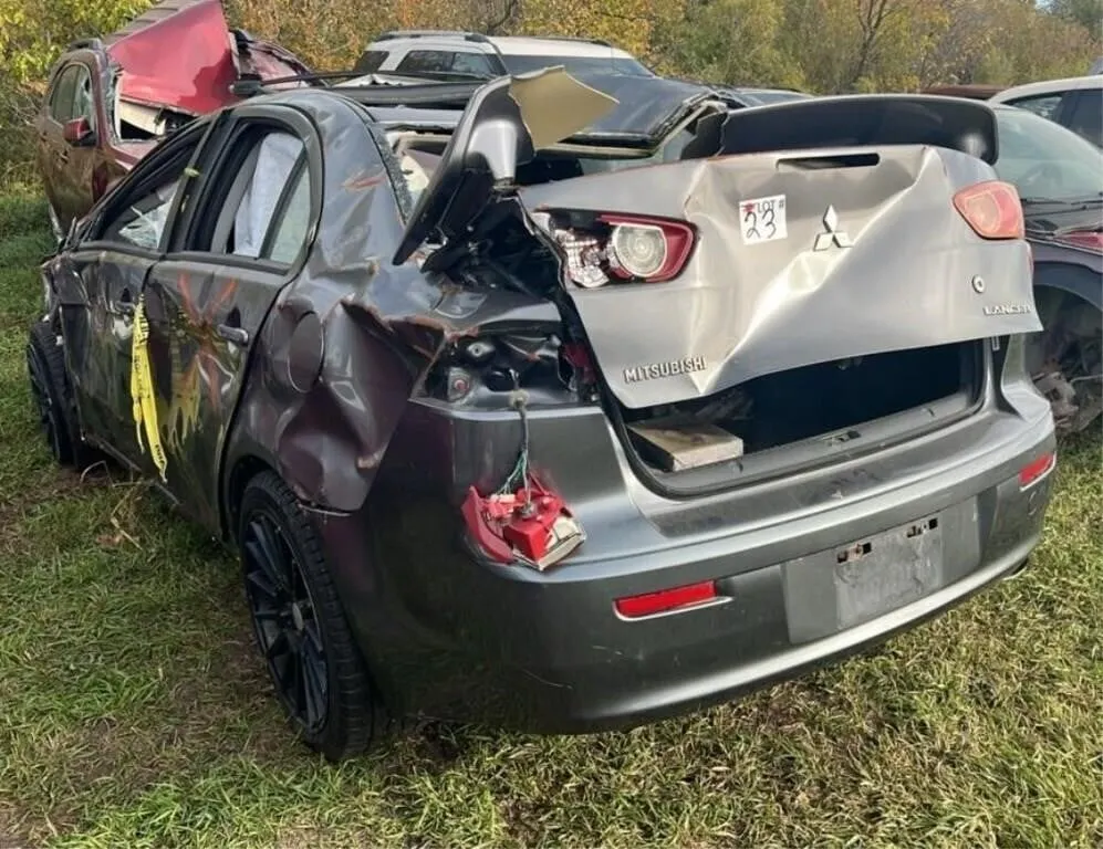 Salvage Vehicle - Mitsubishi Lancer 4DR Car.