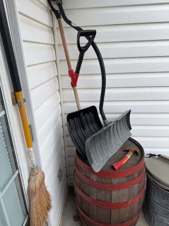 2 Snow Shovels, Push Broom, and Axe with Wooden Barrel