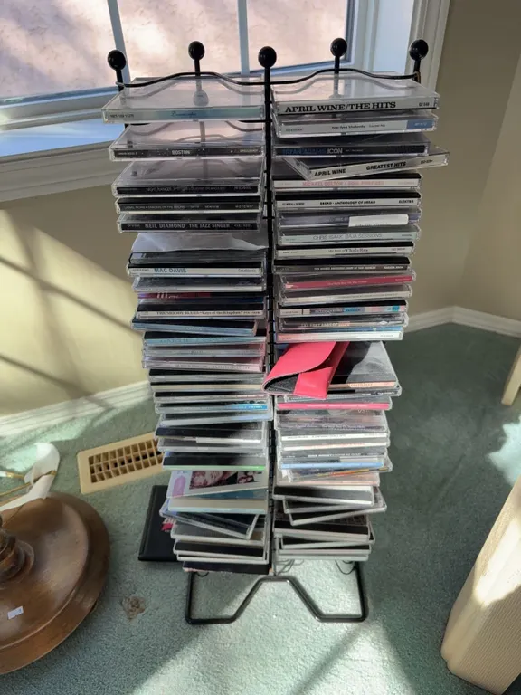 45 Pop, Rock, and Soundtrack CDs with Metal Rack Including April Wine and Neil Diamond