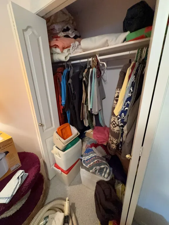 Closet Lot With Assorted Outerwear, Sweaters, Coolers, Vacuum, Blankets