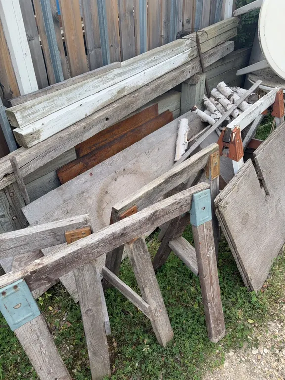 Salvaged Wood, Sawhorses, Round Tabletop, Birch Logs, and Metal Pieces