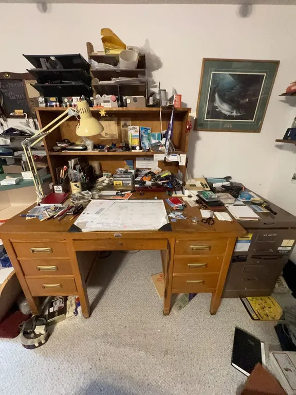 Wooden Desk with Multiple Drawers and Metal Filing Cabinet