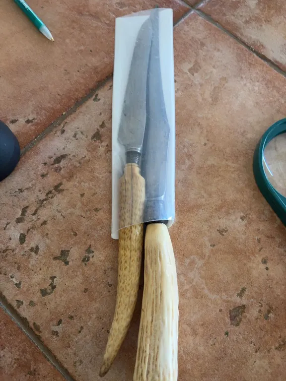 Knives with Stag Handles and Sheaths