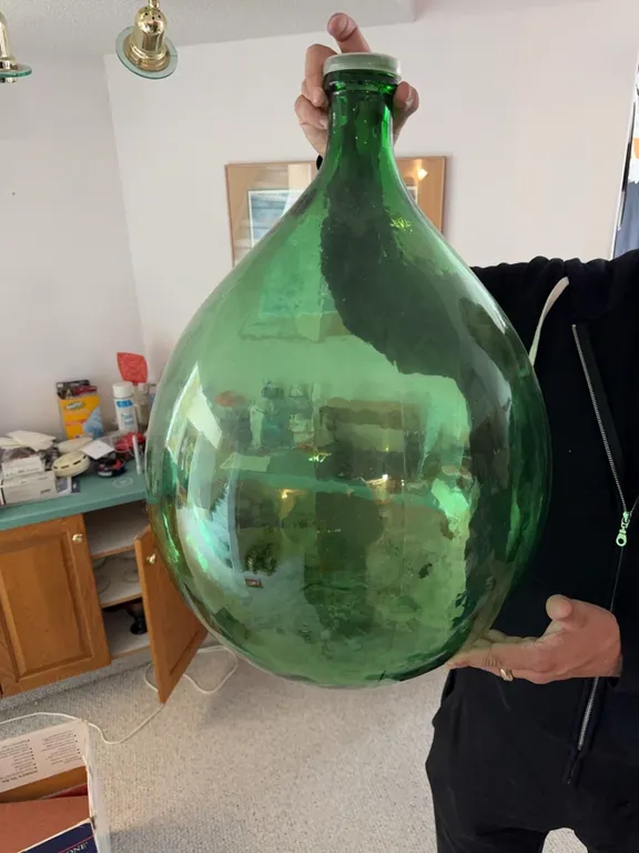 Large Green Glass Demijohn Bottle with Stopper and Wicker Basket