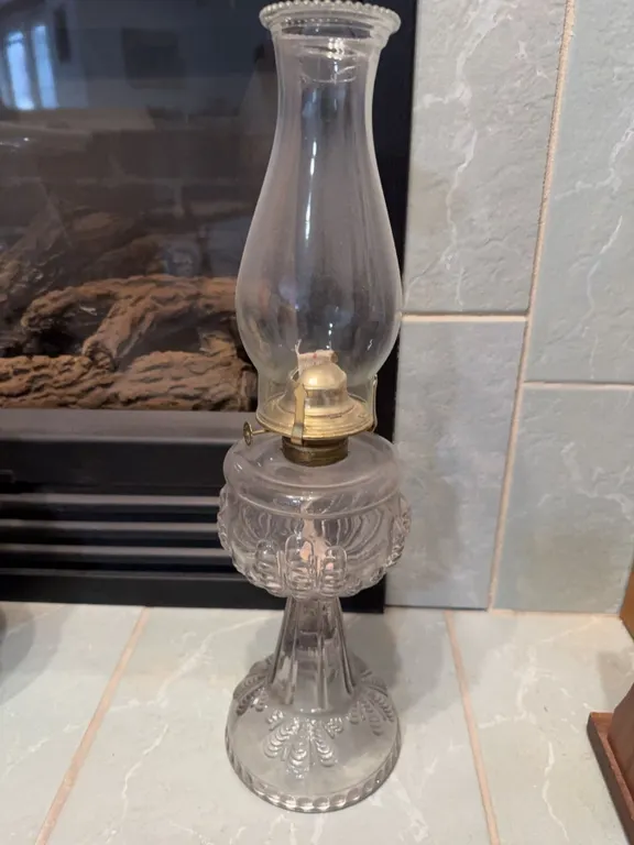 Clear Glass Oil Lamp with Brass Burner and Decorative Patterned Base
