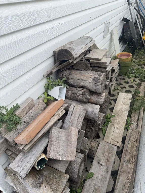 Scrap Wood and Logs with Outdoor Tools and Planters