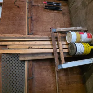 Assortment Of 2 x 4's And 5 Gal Pails