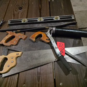 Hand Saws, Crowbar, Grease Gun, And Level