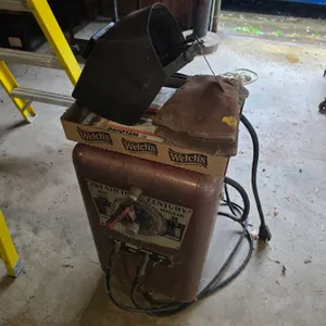 Twentieth Century Arc Welder With Leads, Extra Welding Rods, And Helmet