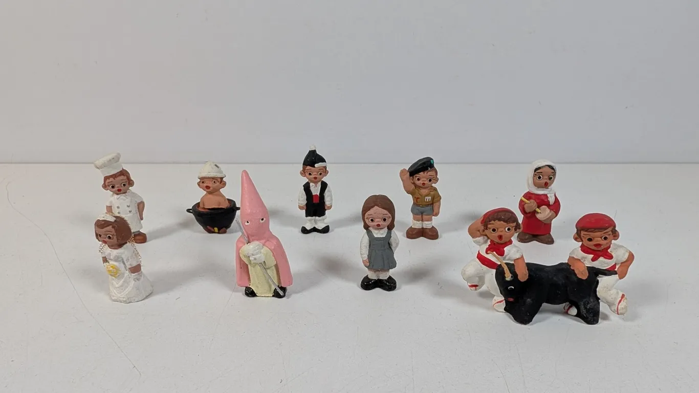 Collection of 10 Painted Mud People Mini Figurines