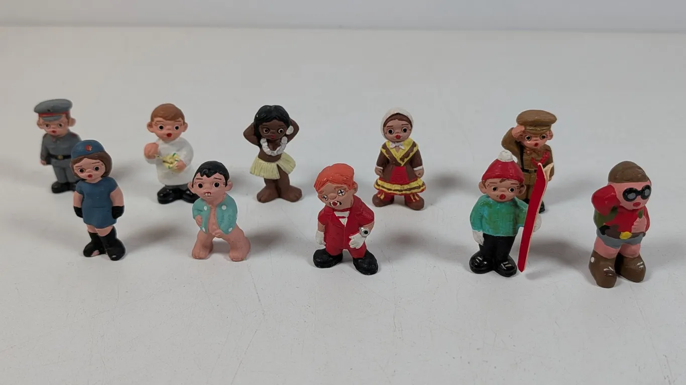 Collection of Painted Mud People Figurines