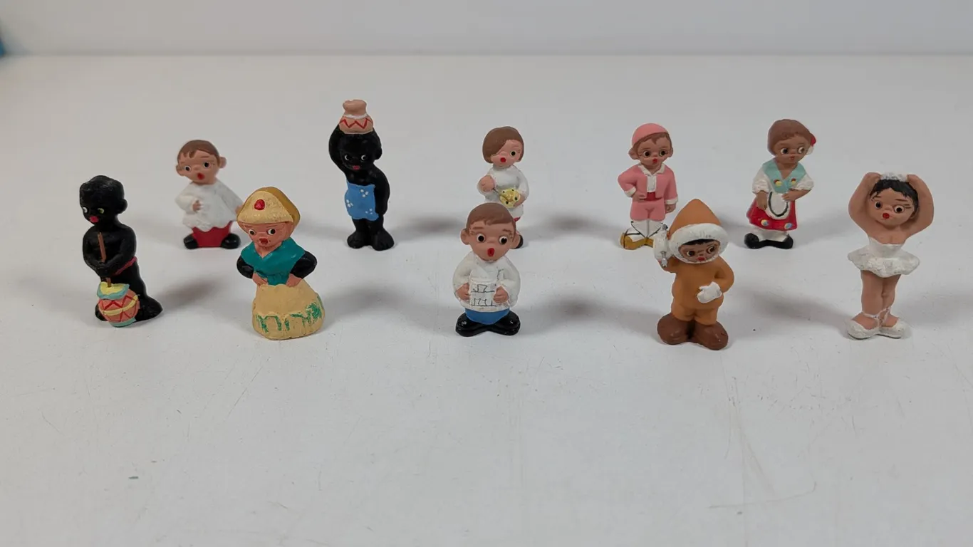 Collection of Assorted Miniature Mud People Figurines