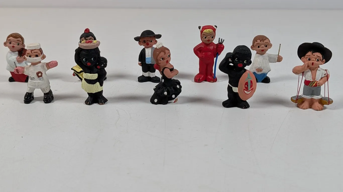 Collection of Assorted Hand-Painted Mud People Figurines