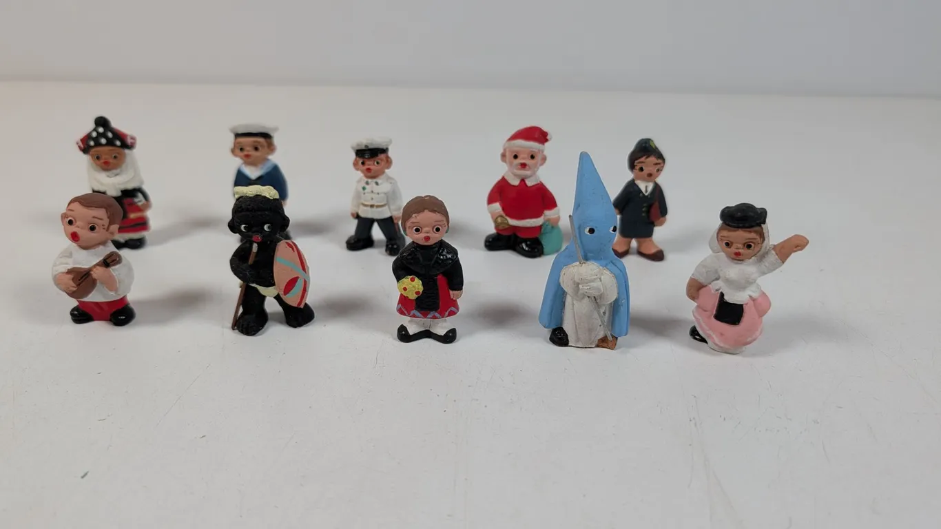 Collection of Miniature Mud People Figurines