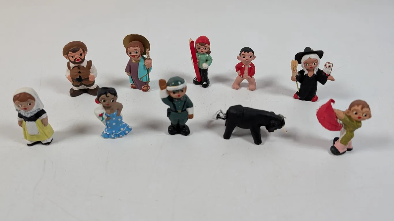 Collection of 10 Vintage Hand-Painted Miniature Mud People Figurines