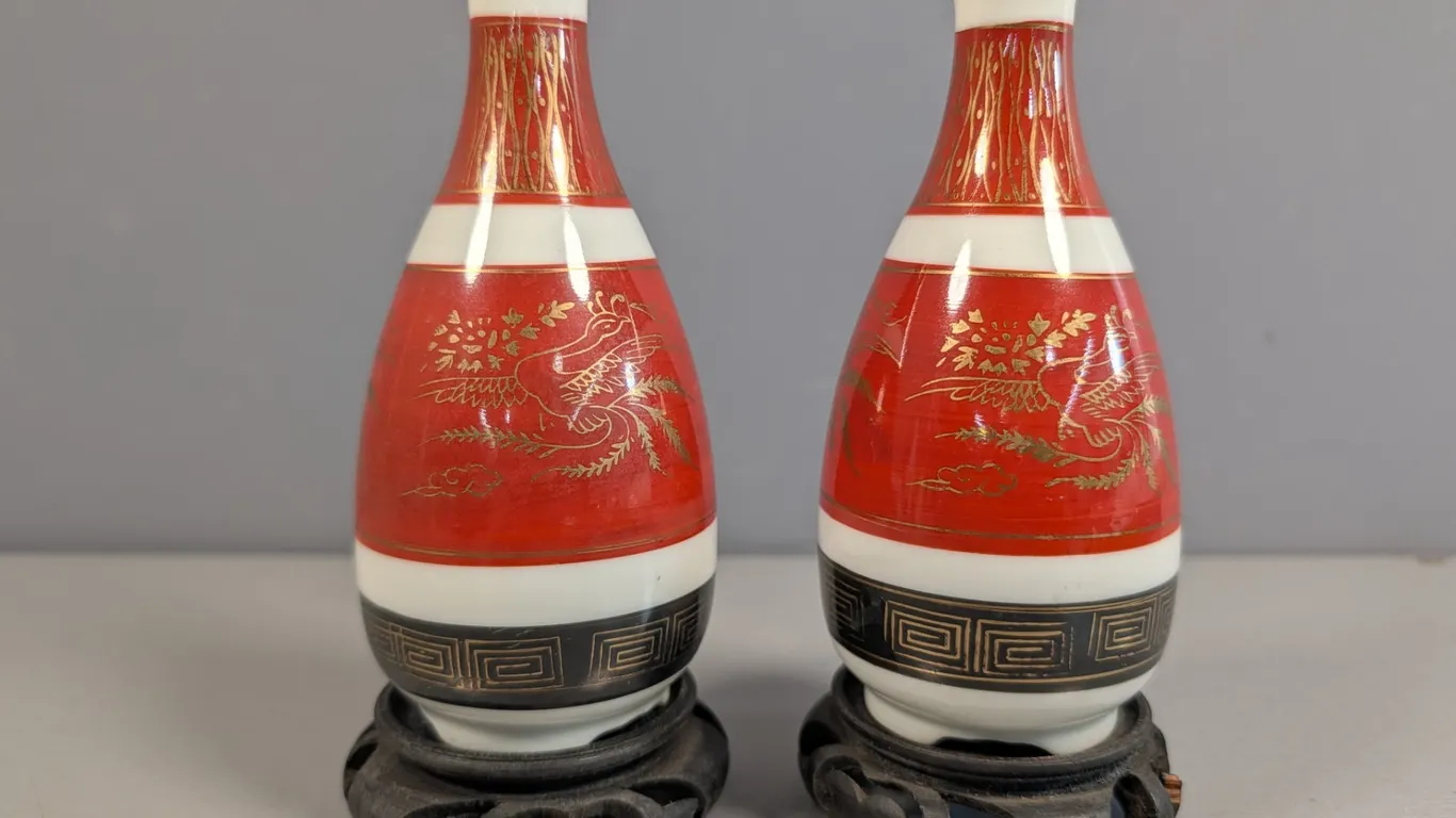 Pair of Red and Gold Oriental Porcelain Vases with Stands