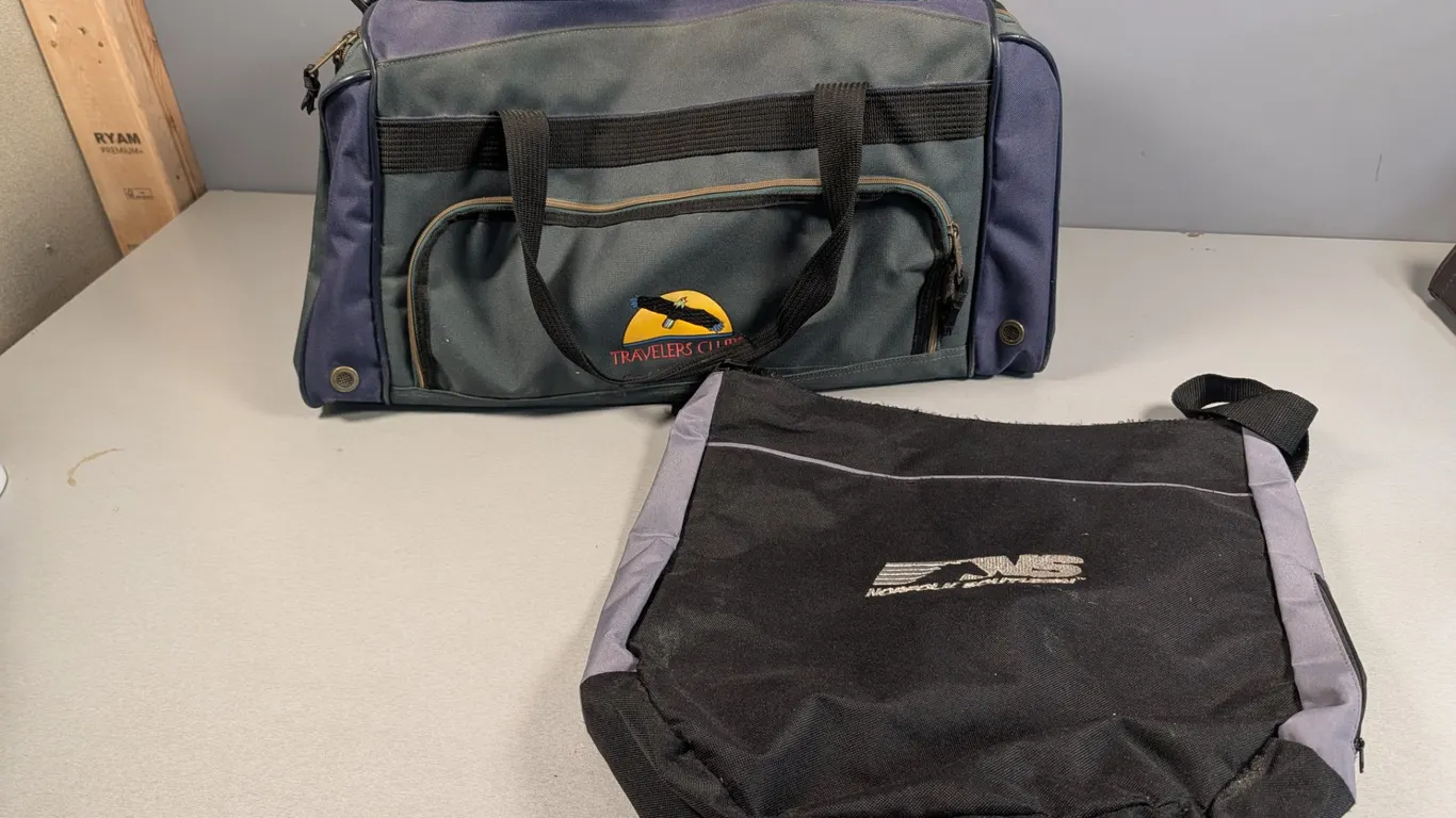 Travelers Club Duffel Bag and Norfolk Southern Messenger Bag