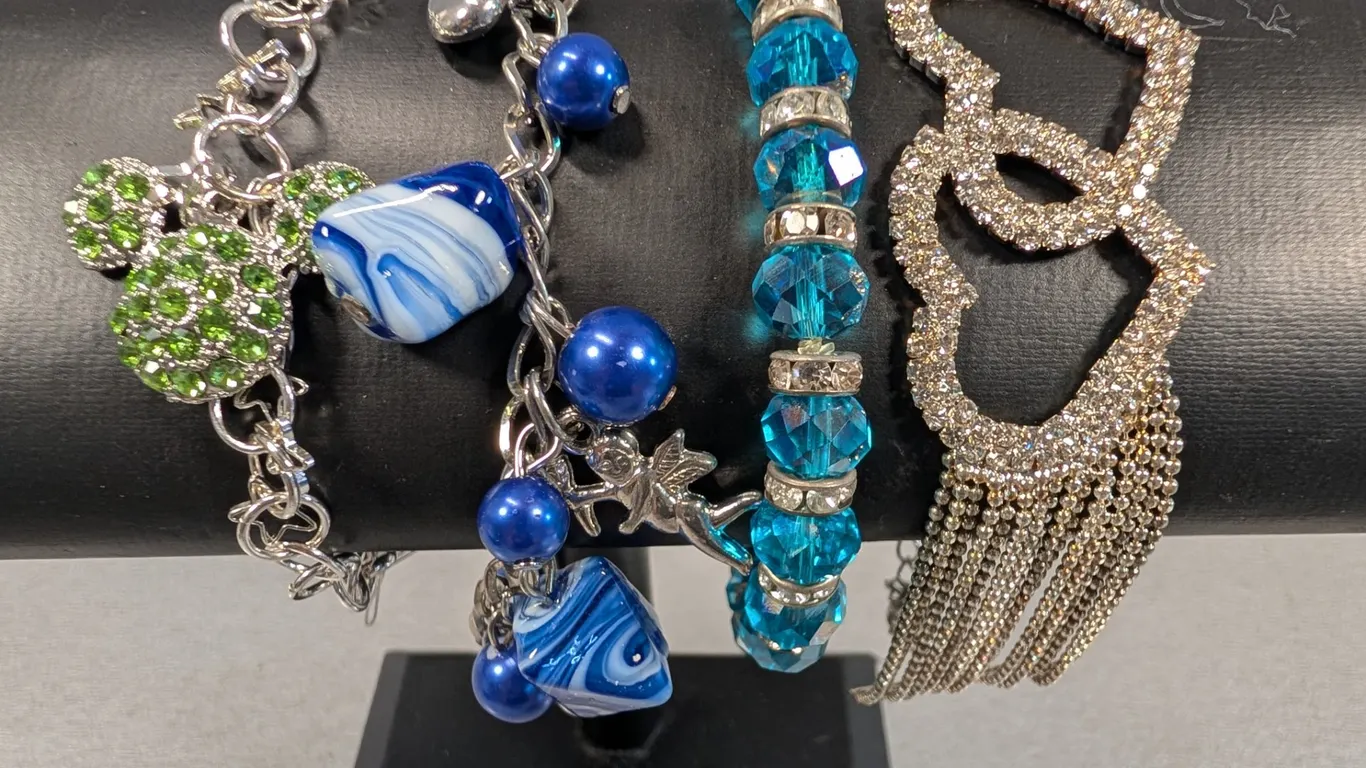 Costume Jewelry Lot with Mickey Mouse Charm, Blue Bead Bracelets, and Rhinestone Hearts