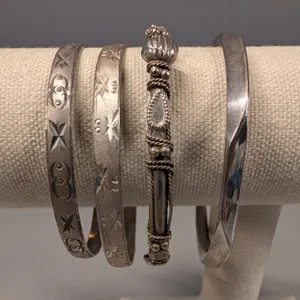 Four Silver tone Bangles with Engraved and Wire-Wrapped Designs